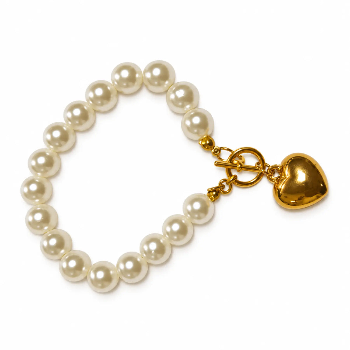 Ivory pearl-style bracelet with gold-tone heart charm
