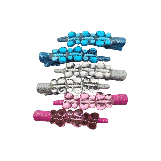 Set of colorful hair clips on a white background