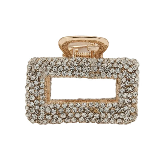 Gold clutch with crystal embellishments on a white background