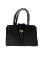 Load image into Gallery viewer, Black handbag with a gold clasp on a white background
