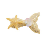 Load image into Gallery viewer, Gold bow hair clip with starfish and pearl on a white background
