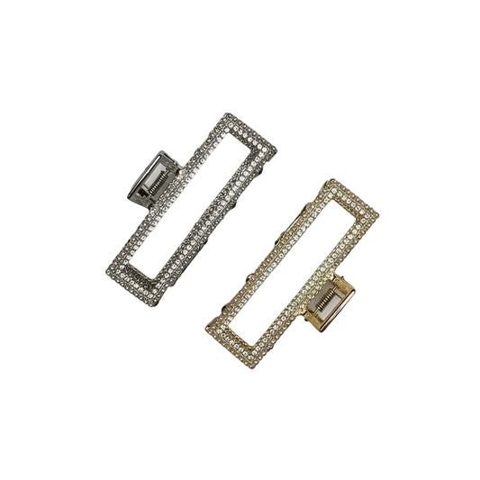 Two metallic hair accessories with rhinestone embellishments, one in gold and the other in silver color, on a white background.