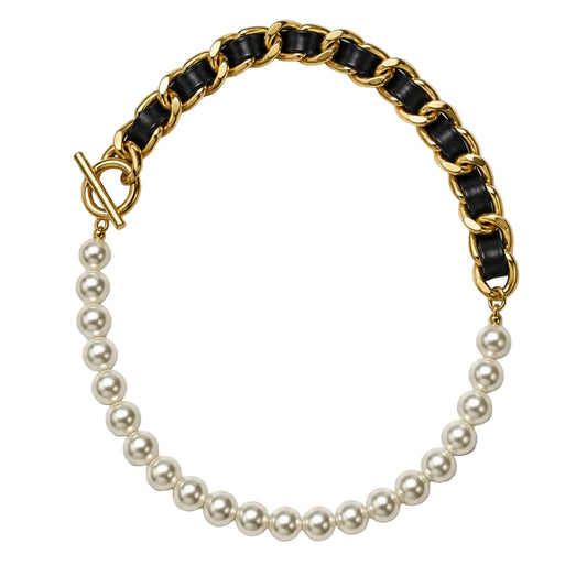 Upright pearl-style necklace with black ribbon woven through gold-tone chain and toggle clasp