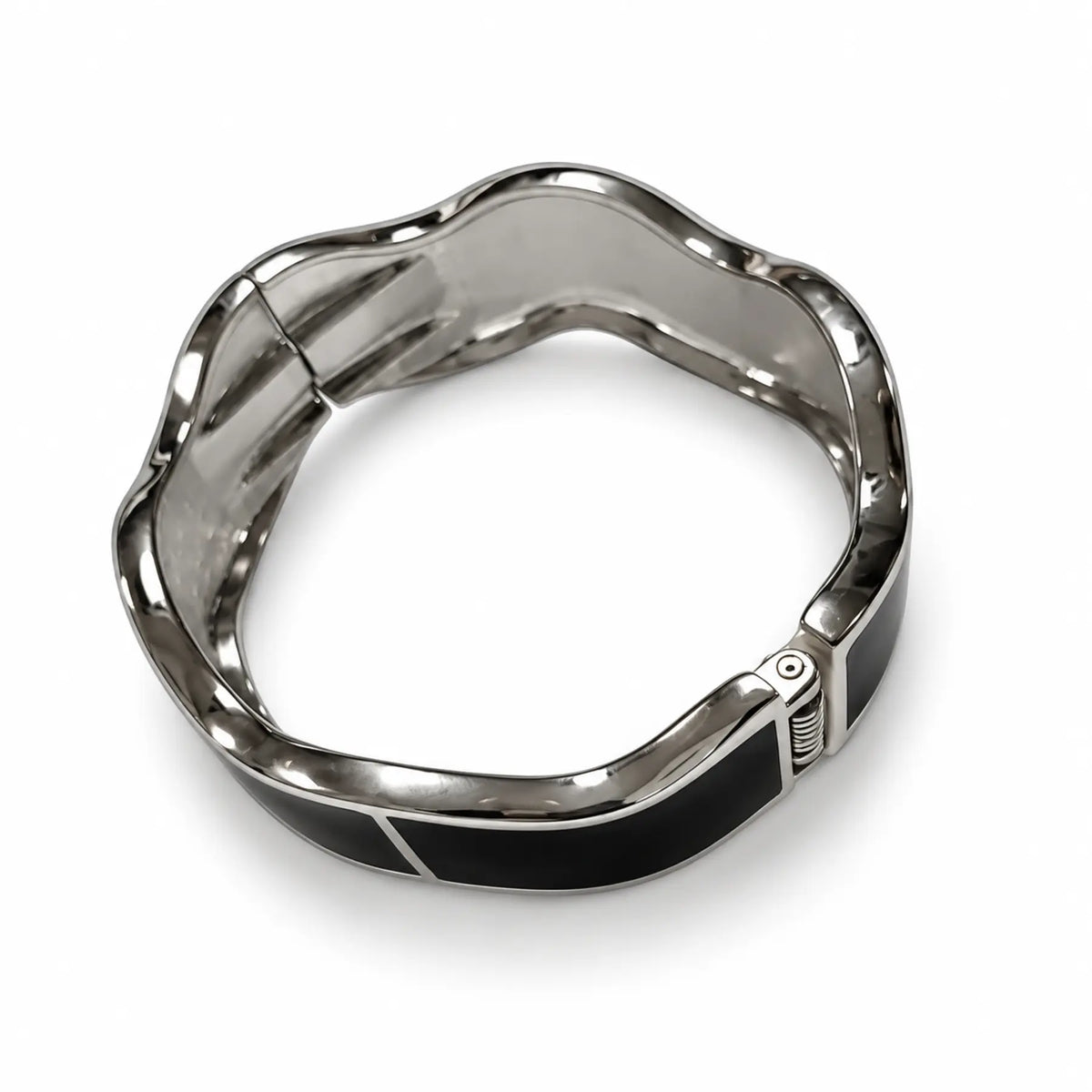 Women's black and silver-tone wavy hinged bangle front view