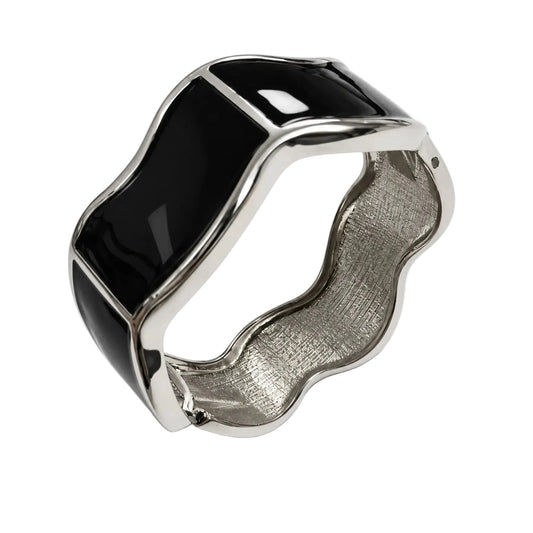 Women's black and silver-tone wavy hinged bangle open view