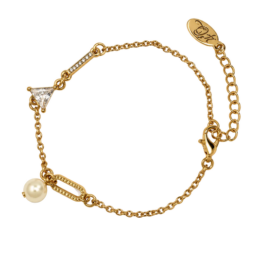 Gold-tone pearl and crystal charm bracelet on white background