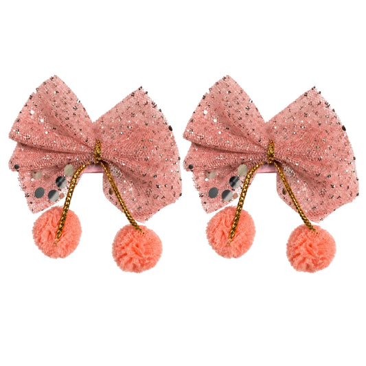 Pair of kids glitter pom-pom bow hair clips in peach