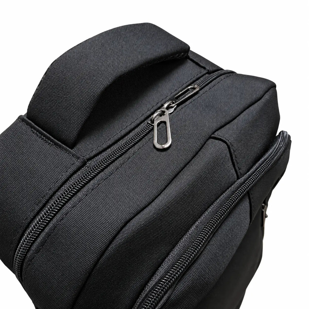 Migant Black Everyday Backpack – handle and zipper detail