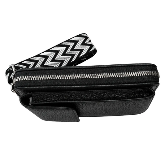Black pebbled phone crossbody bag with silver zipper, side view