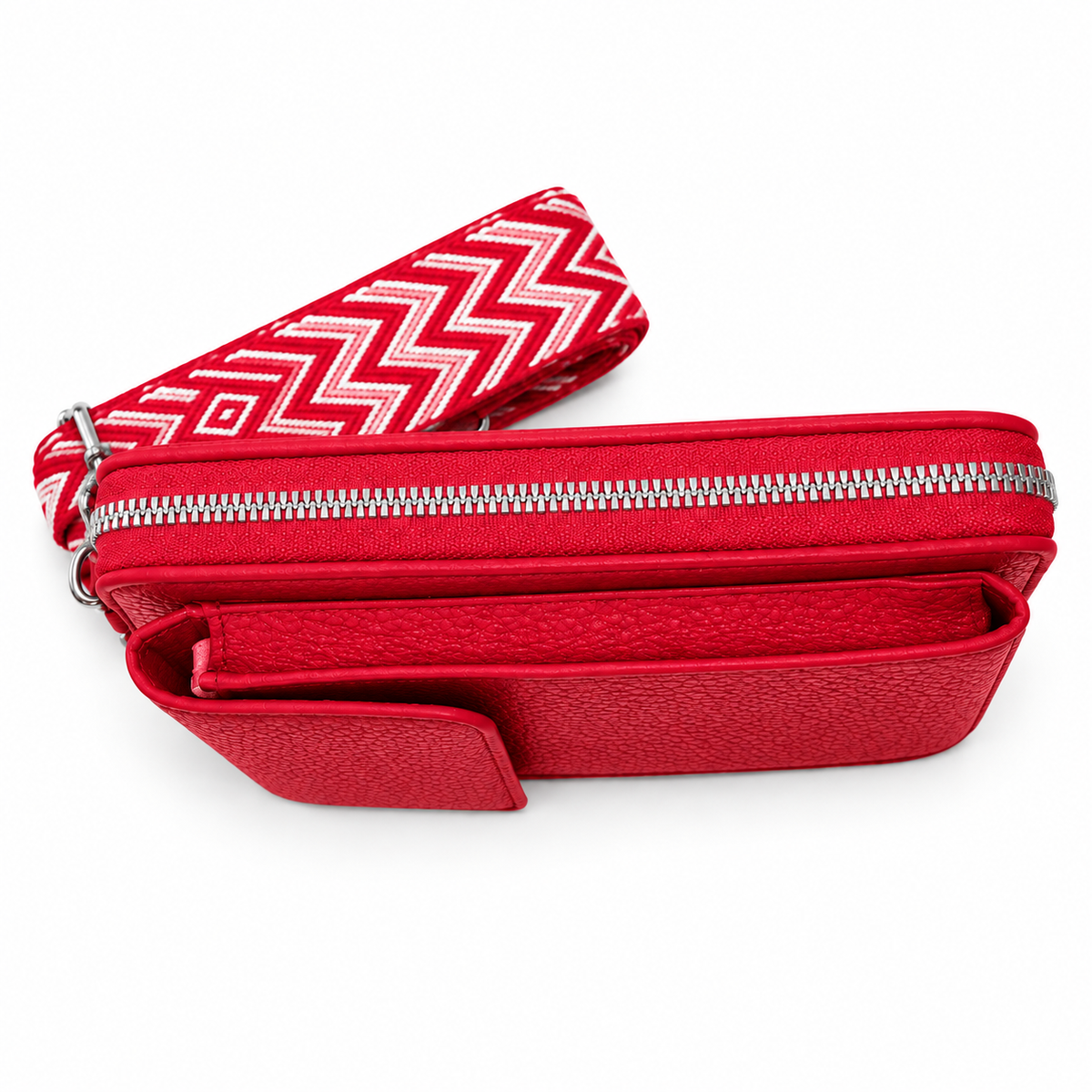 Red pebbled phone crossbody bag with silver zipper and front pockets, side view