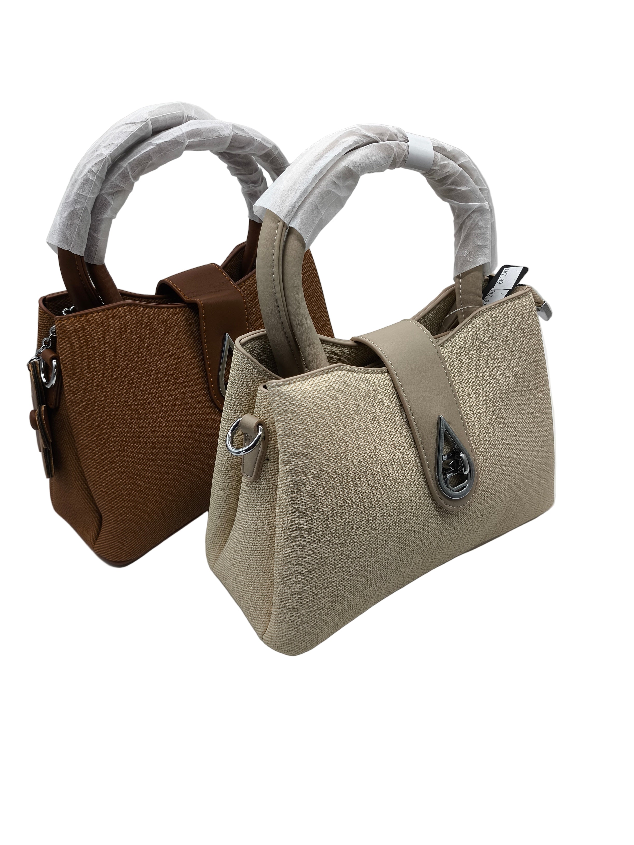 Two handbags, one brown and one beige, on a light gray background