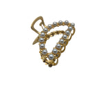 Load image into Gallery viewer, A gold-colored hair clip featuring a strass (rhinestone) design.
