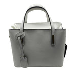 Load image into Gallery viewer, Gray handbag on a light gray background
