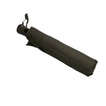 Load image into Gallery viewer, Folded black umbrella on a white background
