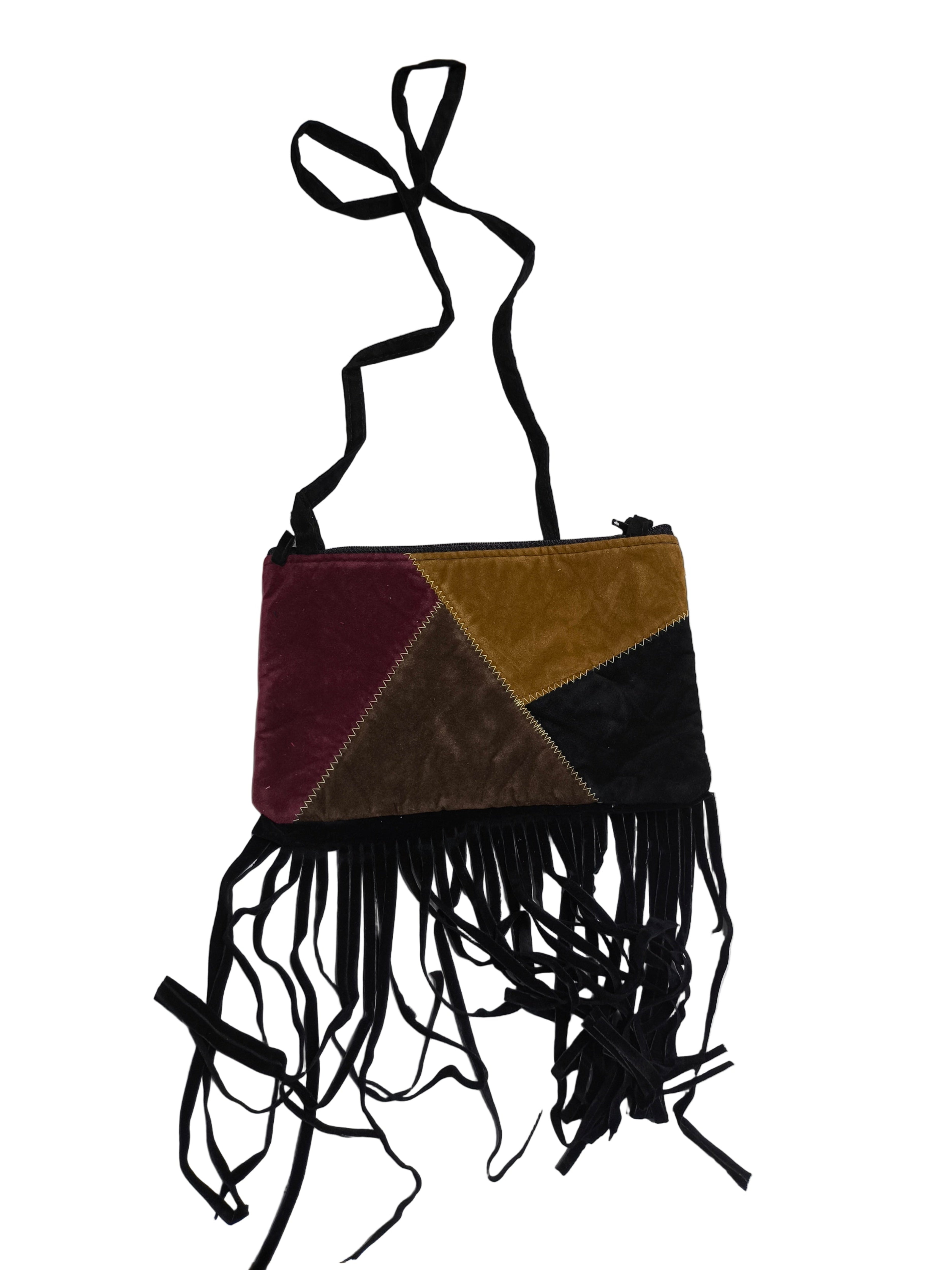 Multicolored bag with fringes on a white background
