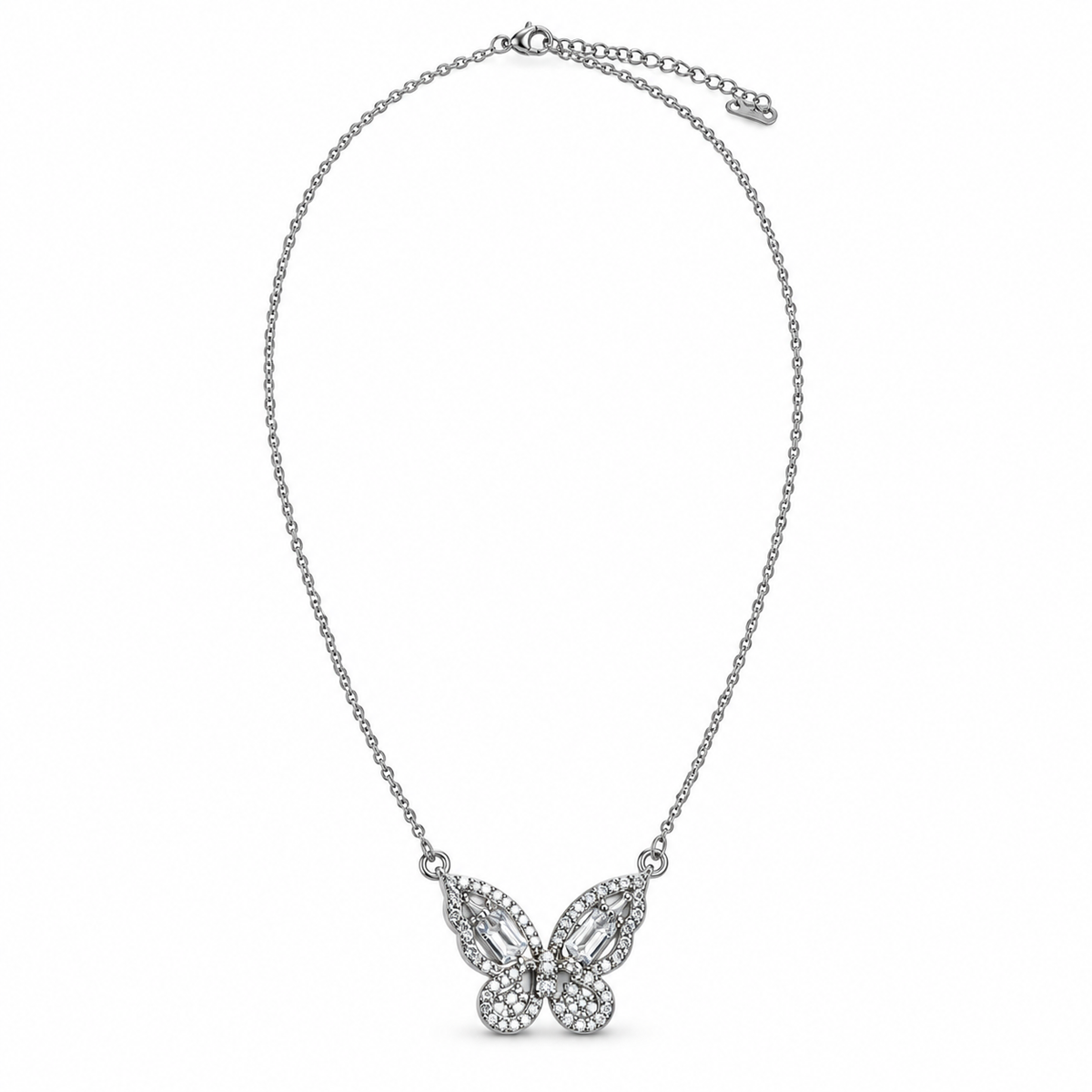 Silver-tone crystal butterfly necklace on white background