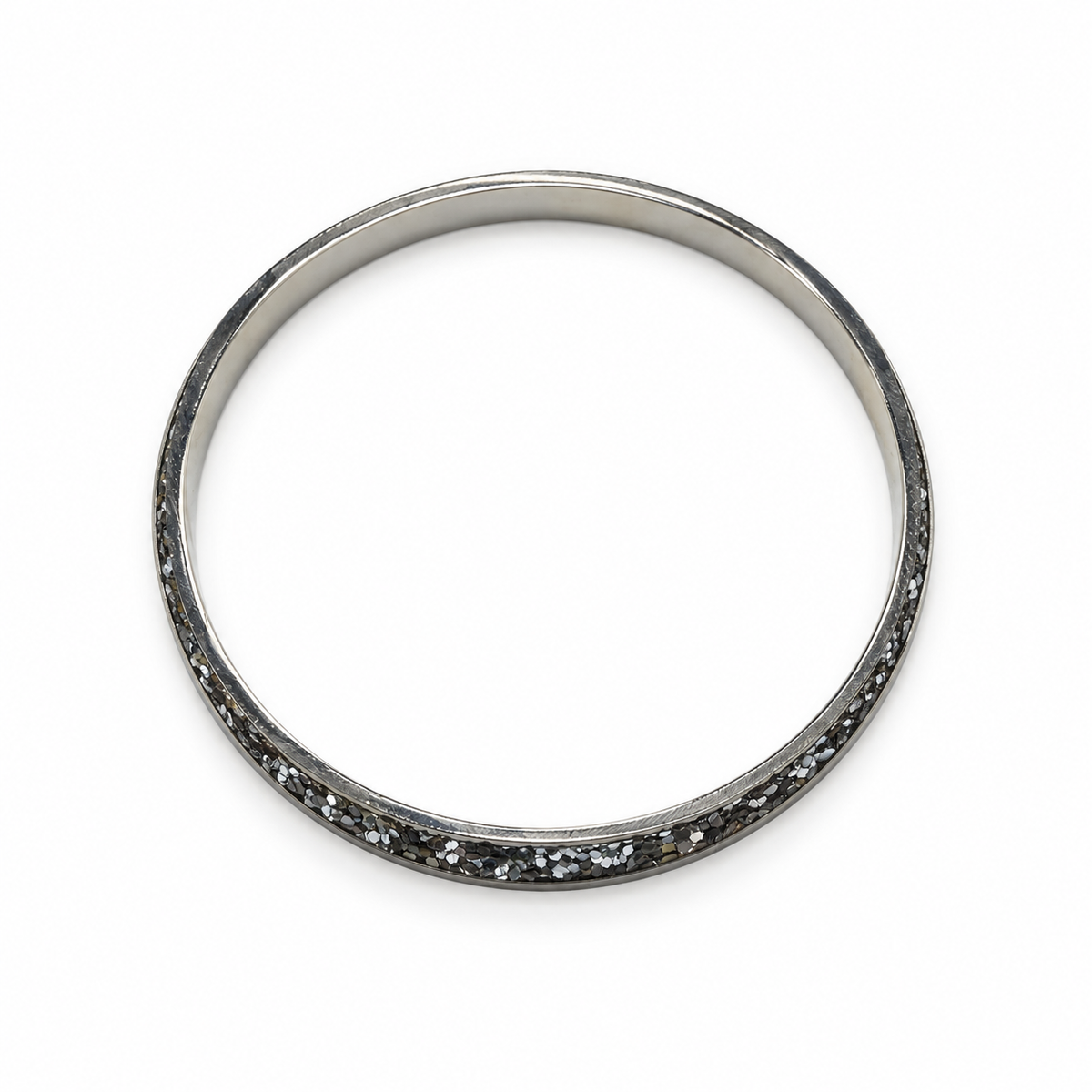 Women's slim silver-tone bangle with dark crystal-chip channel, top view